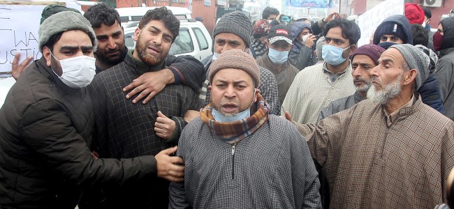Families protest amid heavy snow in Srinagar demanding bodies