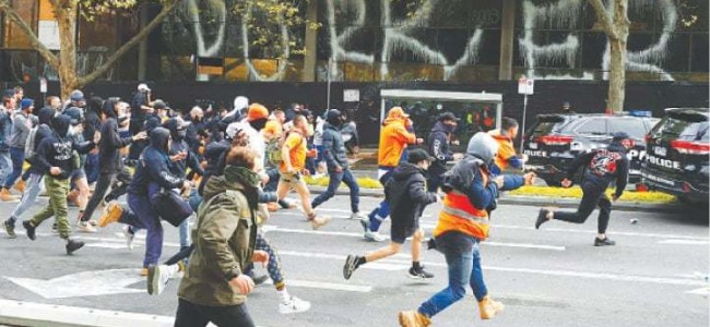 Violence erupts in Melbourne during protest against vaccine
