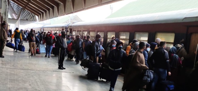 Covid-19: People crowding and jostling against each other at railway station